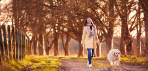 woman with prosthetic hand walking during falltime